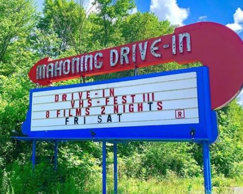A photo of the antique sign outside of the Mahoning Drive-In Theater in Pennsylvania