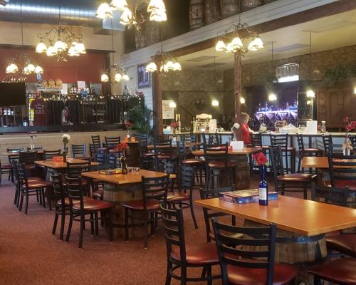 The interior of Cardinal Hollow Winery with tables and dining room