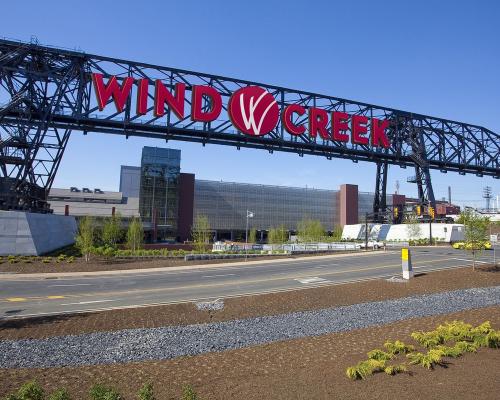 A photo of the exterior of Wind Creek Casino in Bethlehem with the Wind Creek sign afixed to an old steel mill crane