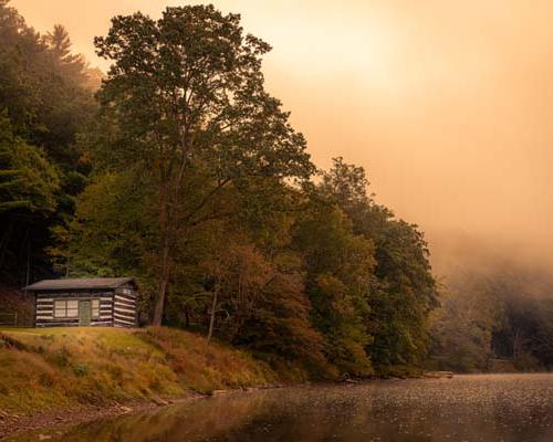 cabin by river