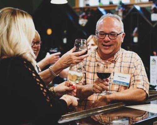 couple enjoying wine at seven Mountain Wine Cellars