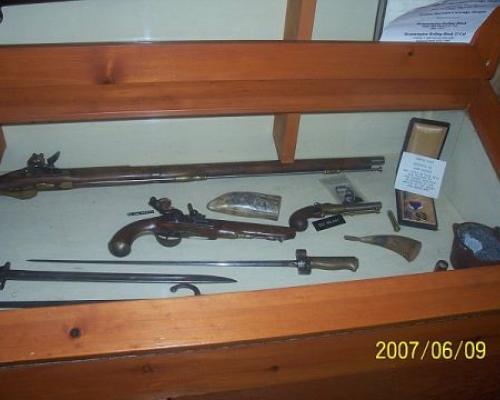 archived knives swords and muzzle gun