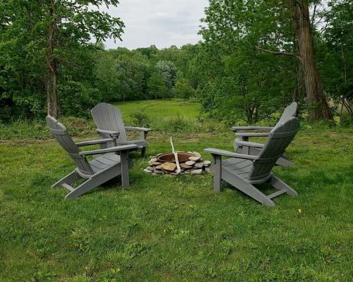 chairs around camp fire