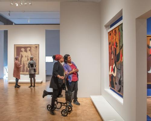 viewer enjoying art inside museum