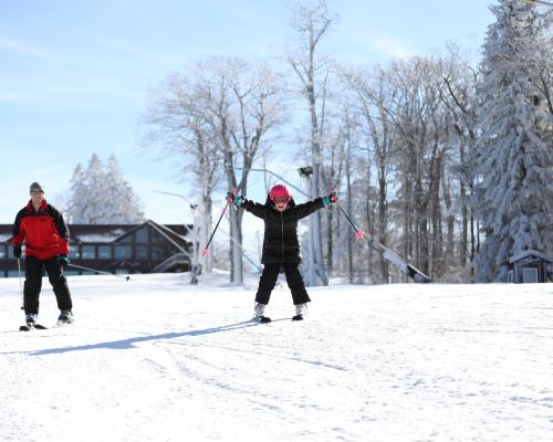 two people skiing