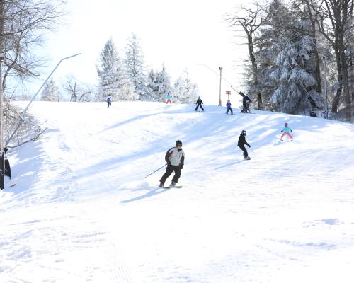 people skiing slopes at Laurel Mountain Resort