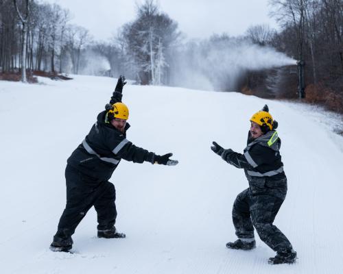 two persons posing with Ski Gear on