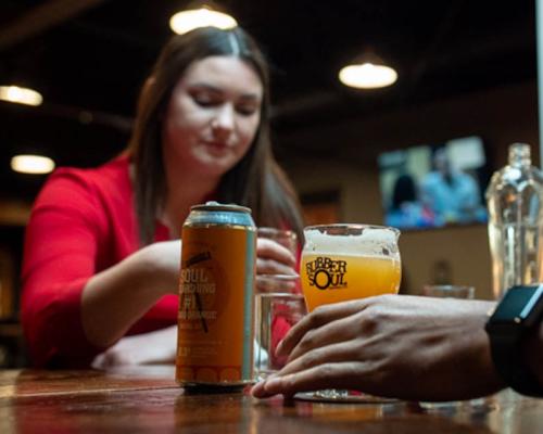 A person enjoying beer