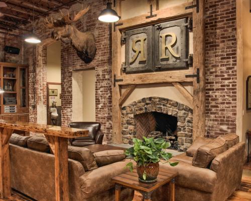 Living area with couches and a fireplace