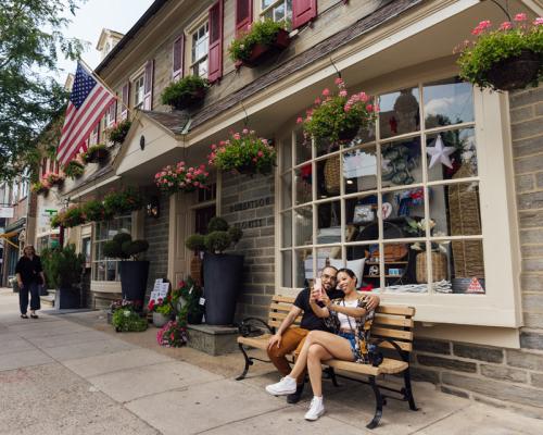 couple taking selfie Chestnut Hill Shopping District