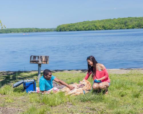 a couple having picnic date by Lake Nockamixon
