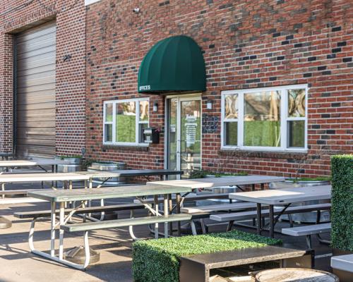 Outdoor seating area at Neshaminy Creek Brewing Company