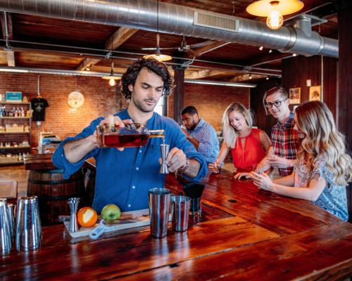bartender mixing cocktail drink