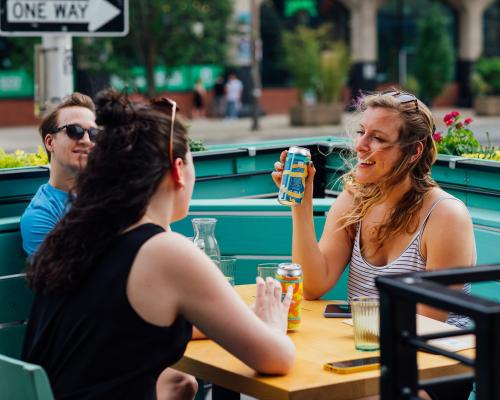 a group of friends enjoying drinks at Triple bottom brewing
