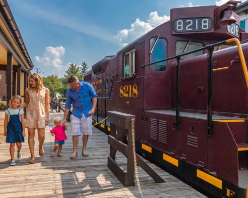 family getting on train ride at New Hope Ivyland Railroad in Bucks County