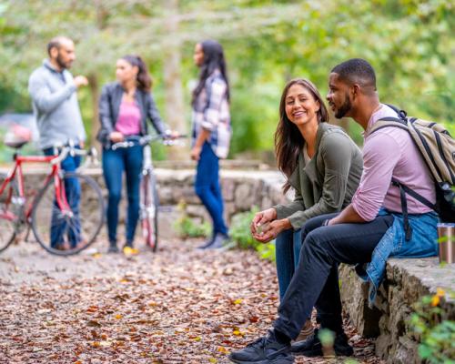 a group strolling thru Wissahickon Valley Park 