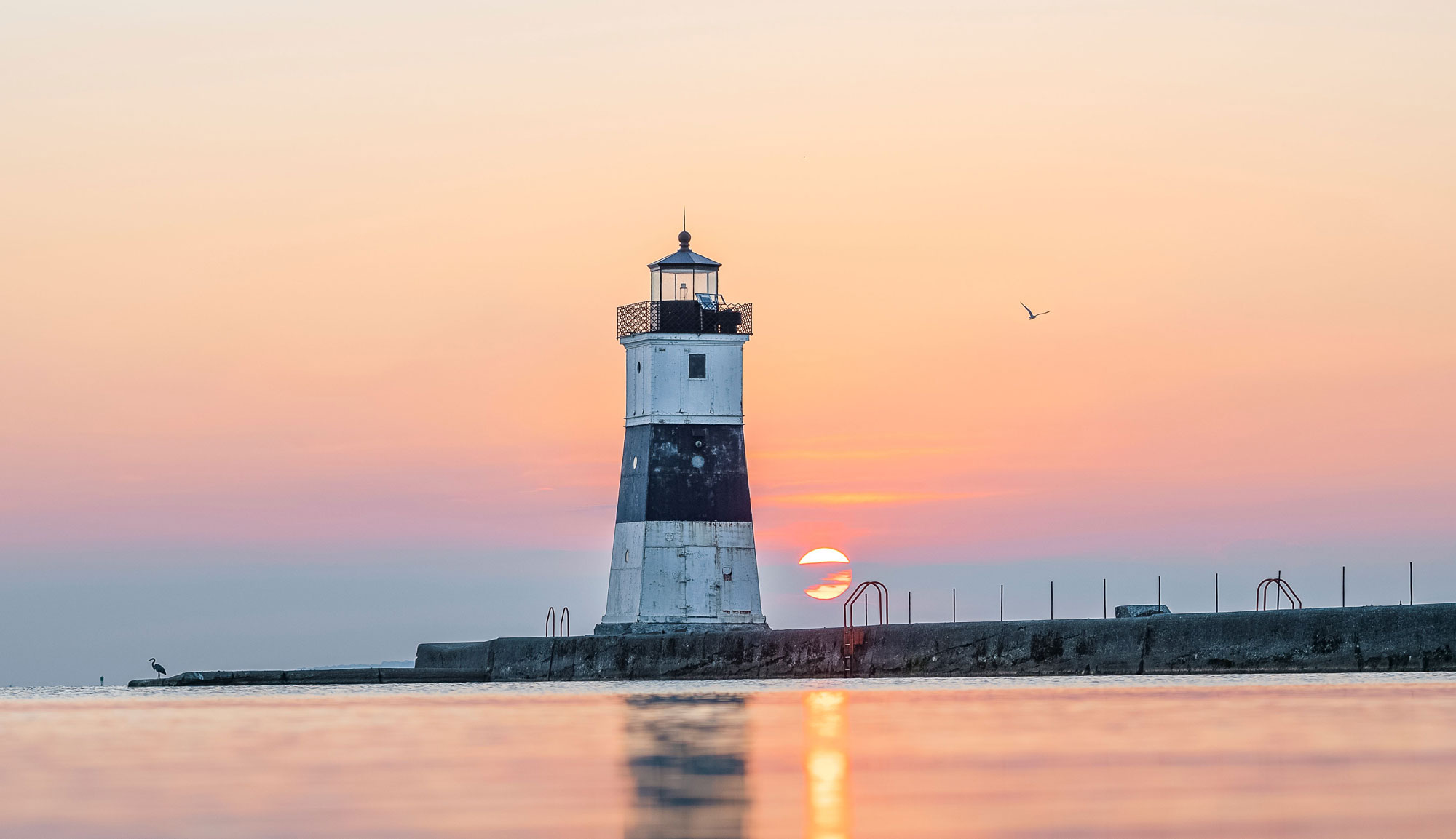 Lighthouse by river