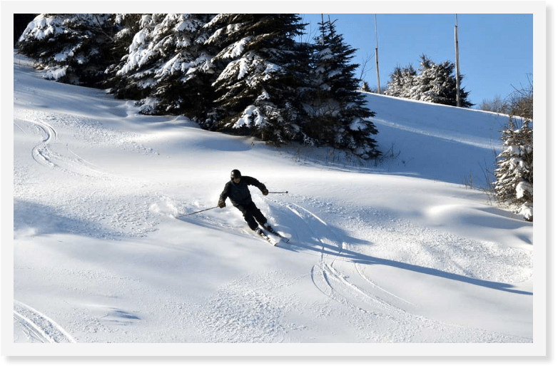 Ski lift of snowy mountain